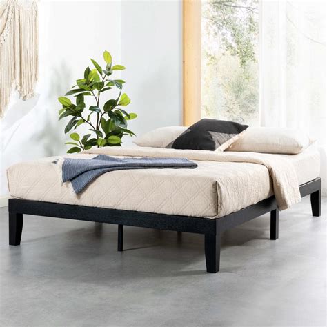 Mellow platform bed - This platform bed is a simple and modern design created from a combination of a sturdy metal frame and a soft fabric headboard. The extra thick and sturdy metal structure is made with 100% steel to provide durable and sleek support. We've converted the traditional headboard into a lower, angled backboard that allows for the perfect leaning position when lounging in bed. The angled backboard is ... 